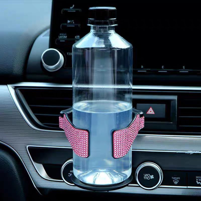 Coche transfronterizo Portavasos de agua incrustado en diamantes Salida de aire del coche con estante de bebidas de diamante Cenicero Soporte