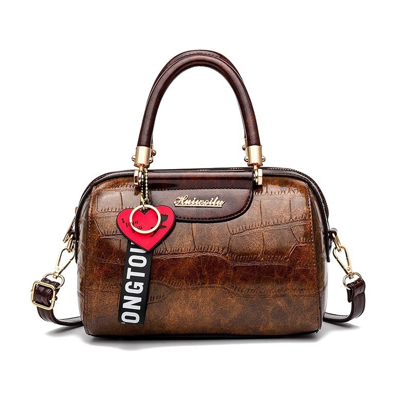 Bolso de textura 2025 nuevo bolso de hombro con diseño de patrón de piedra, bolso de mensajero universal de asistencia informal, bags transfronterizos