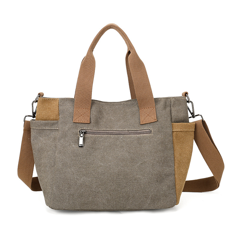 2026 bolsas de lona para mujeres nuevas bolsas de mochila casuales TOT con estilo coreano simple y gran capacidad bolsas de hombro