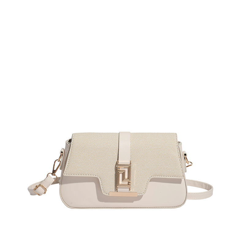 Nicho de diseño de alta sensación de silla de montar bolso para mujeres 2026 nuevo estilo coreano simple brazo de moda de hombro pequeño bolso