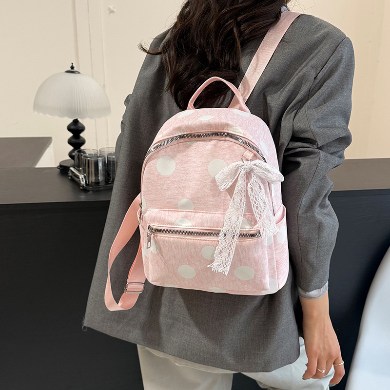 Mochila de viaje casual de moda de gran onda para estudiantes de clase, gran capacidad de personalidad, bolso de mujer simple al aire libre