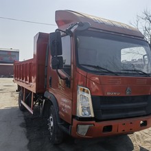 重汽豪沃蓝牌平板拖车价格(国4大泵自卸车福田箱式车出口