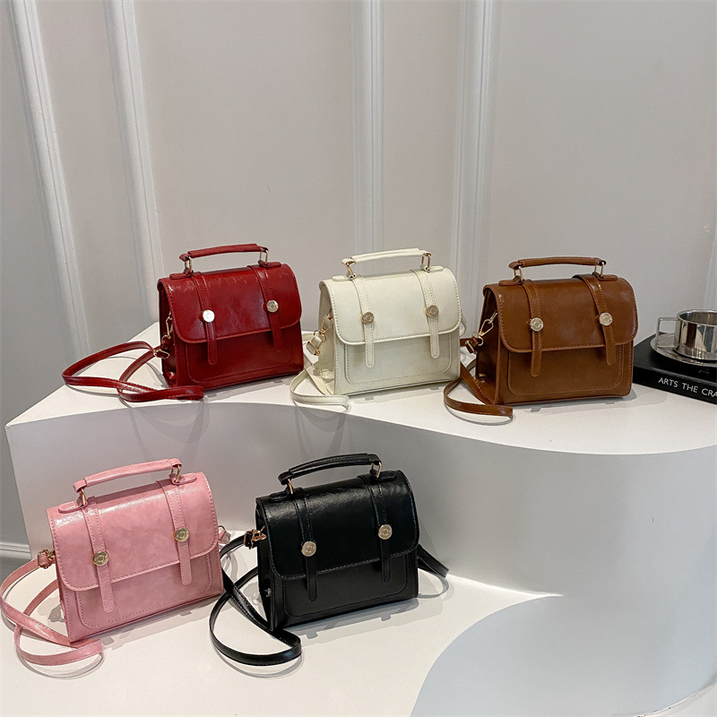 Retro Maillard British College Style Bolso mujer 2025 nuevo bolso de mensajero textura portátil Cambridge pequeño bolso cuadrado marea