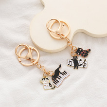 音樂鋼琴貓咪鑰匙扣掛件時尚包包配件掛飾耳機套包包配飾現貨批發