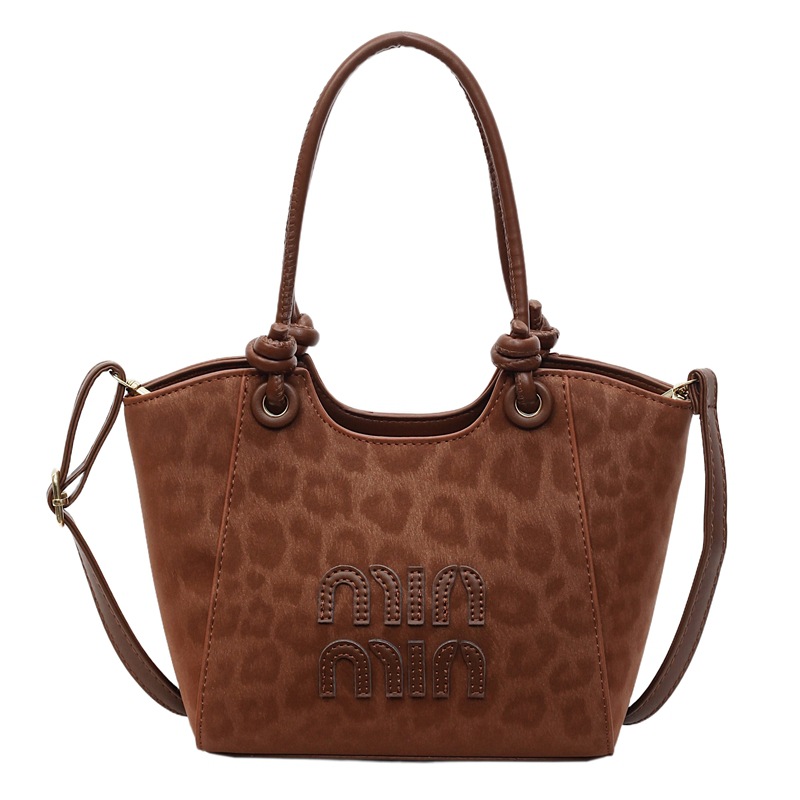 Leopardo transfronterizo de gran capacidad bolso de cubo portátil para mujeres otoño y invierno 2025 nuevo estilo coreano bolso de hombro de moda bolso de mochila