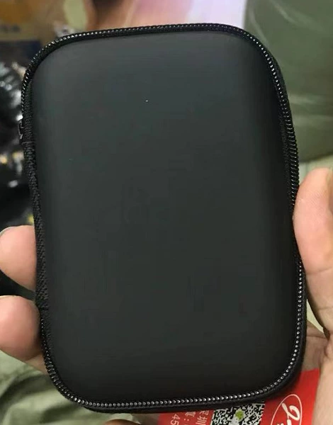 Camera, black equipment bag