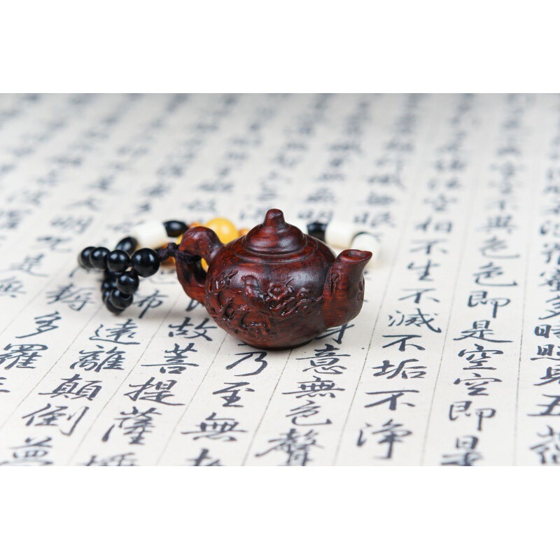 紫檀木の彫刻は壺の福袋を手にして、手にします。|undefined