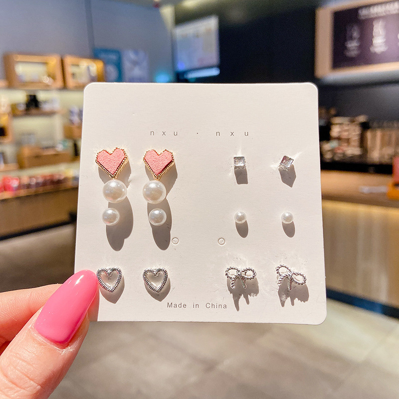 Aretes de aleación coreana de perlas de alto nivel de perlas largas al por mayor transfronterizas pendentes de cabina ligeros de lujo exagerados perfumes de orejas mujeres