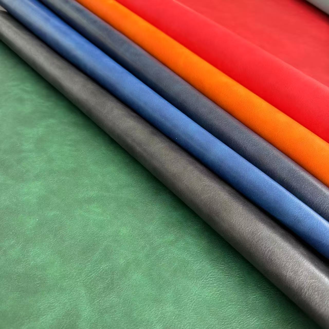 24N1双色复古纹 双色压变PU革0.7mm水刺底酒盒手机皮套相册包装革