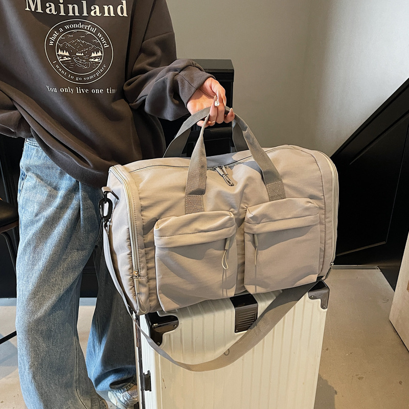 Foldable handheld travel bag