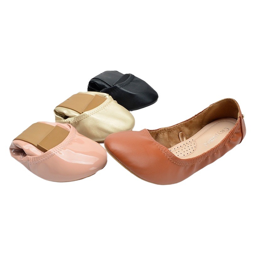 Zapatos de rollo de huevo de estilo europeo y americano zapatos de color sólido gruesos de fondo suave zapatos de las señoras patrón de las ovejas de primavera plana de corte bajo zapatos curvos zapatos del barco