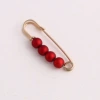 3.8CM gold needle big red beads