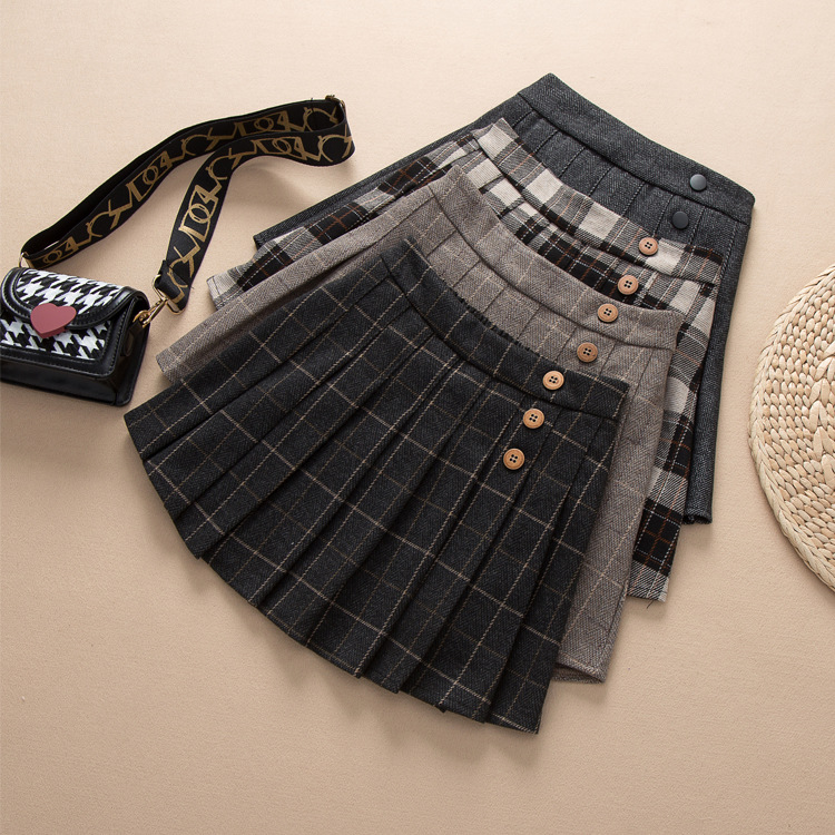 Falda de niñas 2023 Otoño e Invierno Nueva falda a cuadros anti-exposición JK Falda plisada falda de lana falda engrosada