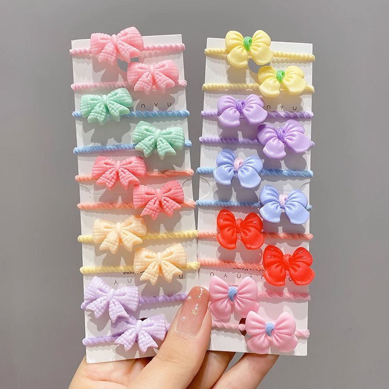 La cuerda del pelo del bebé de las muchachas de la banda de goma de los niños no lastima el pelo Los accesorios del pelo del pulgar del tamaño pequeño atan la banda de goma del pelo