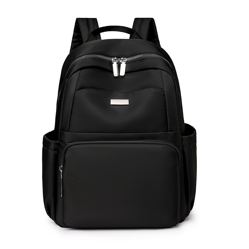 2024 verano nuevo estilo casual damas mochila de nailon simple y versátil mochila de computadora de gran capacidad para estudiantes al por mayor