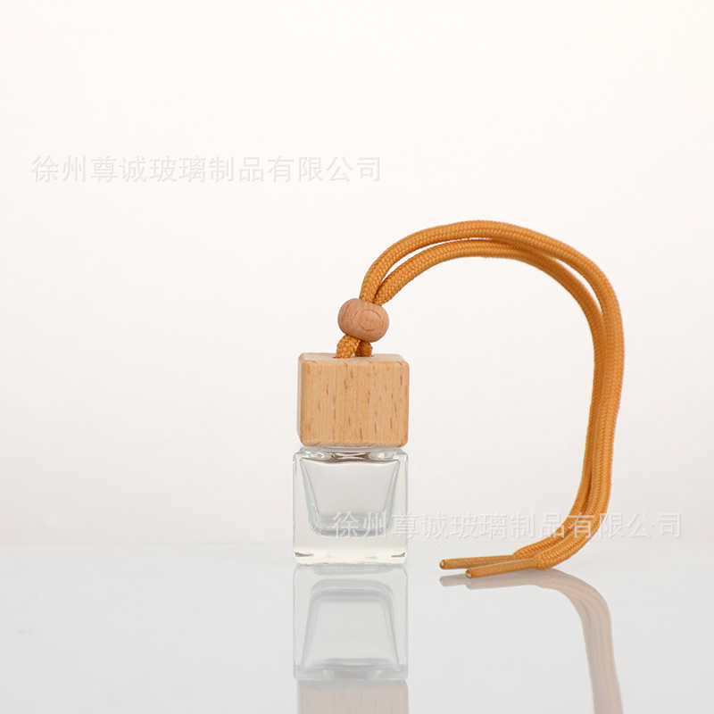 Botella de perfume de cables de automóvil botella vacía botella de perfume de automóvil colgante tapa de madera botella vacía perfumes volátiles al por mayor