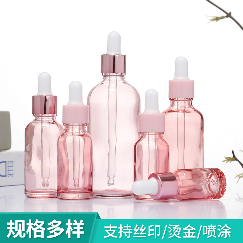 Botella de aceite esencial de color rosa transparente Esencia de líquido sub-botella gotero de vidrio Aceite de Masaje puro Rocío líquido sub-envasado de vidrio botella vacía
