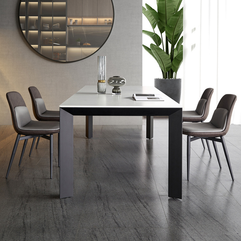 Mesa de comedor de tabla de roca gruesa de Delifeng, combinación de mesa y silla de comedor rectangular de lujo moderno y pequeño tipo de casa minimalista italiana
