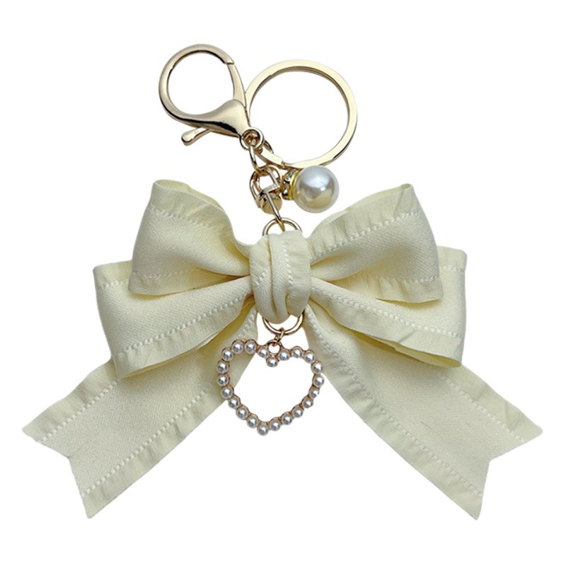 Estilo coreano arrugas cinta arco llavero colgante perla amor chica simple bolsa colgante teléfono móvil colgante