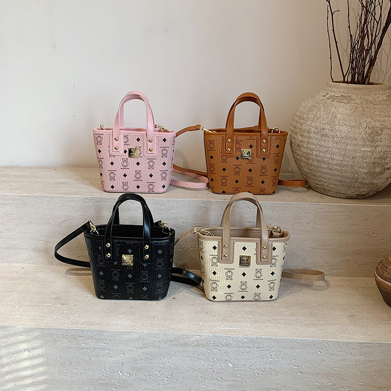 Bolso de cubo portátil 2024 Bolso popular de estilo caliente de este año para mujer, otoño e invierno, nuevo bolso de mensajero de moda para mujer