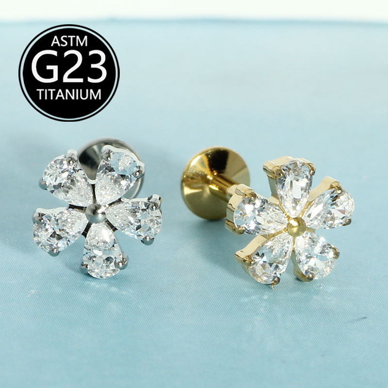 Silver pointed spike labret stud material detail