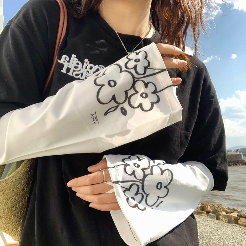 花朵冰絲防曬袖套女冰袖騎車防紫外線寬鬆可愛開車護手臂喇叭袖子