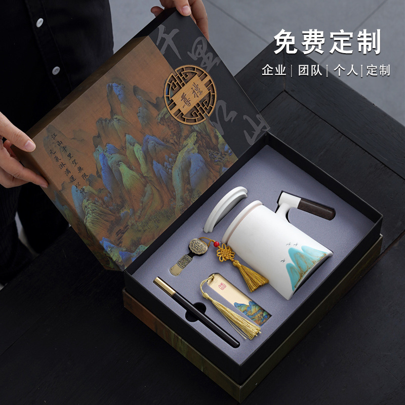 会社のビジネスセットの贈り物千里江山のノートパソコンの陶磁器のお茶の杯の贈り物のお土産は取引先にプレゼントします。|undefined
