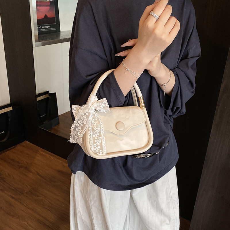 Bolso cuadrado pequeño de mano de estilo occidental de moda para mujer 2025 nuevo bolso de hombro casual de todo fósforo bolso de mensajero de alta calidad transfronterizo