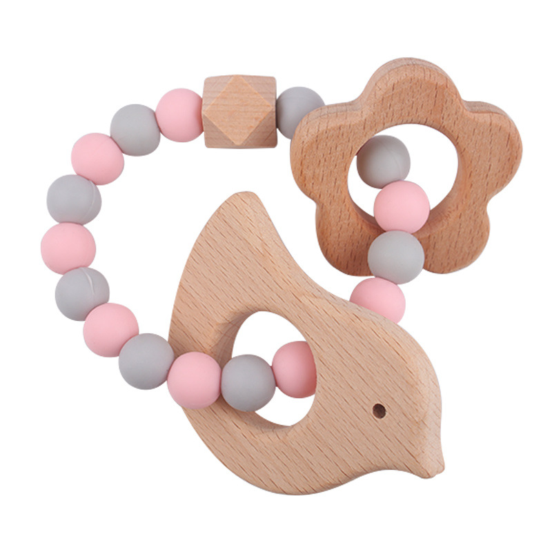 Nuevo bebé dibujos animados pájaros pulsera de madera de haya juguetes creativos pulsera de dientes de silicona pulsera de dientes