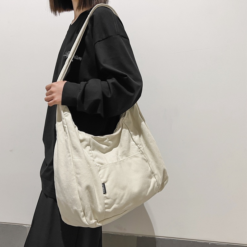 2024 nuevo estilo de ocio, arte, lona de gran capacidad para damas, bolso de mensajero de hombro de viaje de todo fósforo de moda para hombres