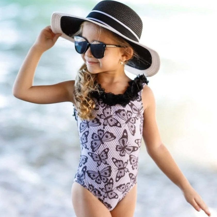 2023 verano nuevo traje de baño para niños traje de baño de una pieza para niñas lindo Bikini de encaje de mariposa traje de baño europeo y americano