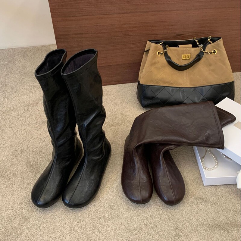 Soft leather pleated high-tube boots for women, loose straight flat-soled riding boots, autumn and winter Melard over-the-knee long boots