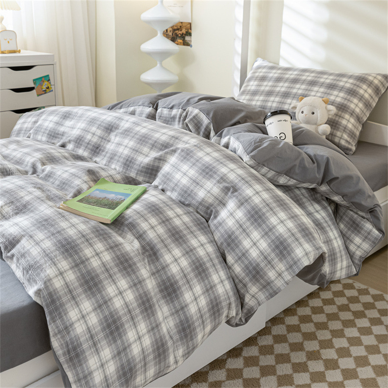 Verano dormitorio universitario conjunto de algodón de tres piezas 2025 nuevo estilo funda de edredón de algodón sábana cama de cuatro piezas ropa de cama