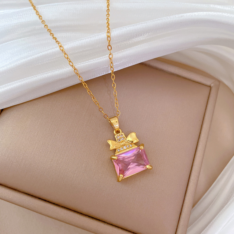 Set collana e orecchini a farfalla con boccetta di profumo_voghion.com