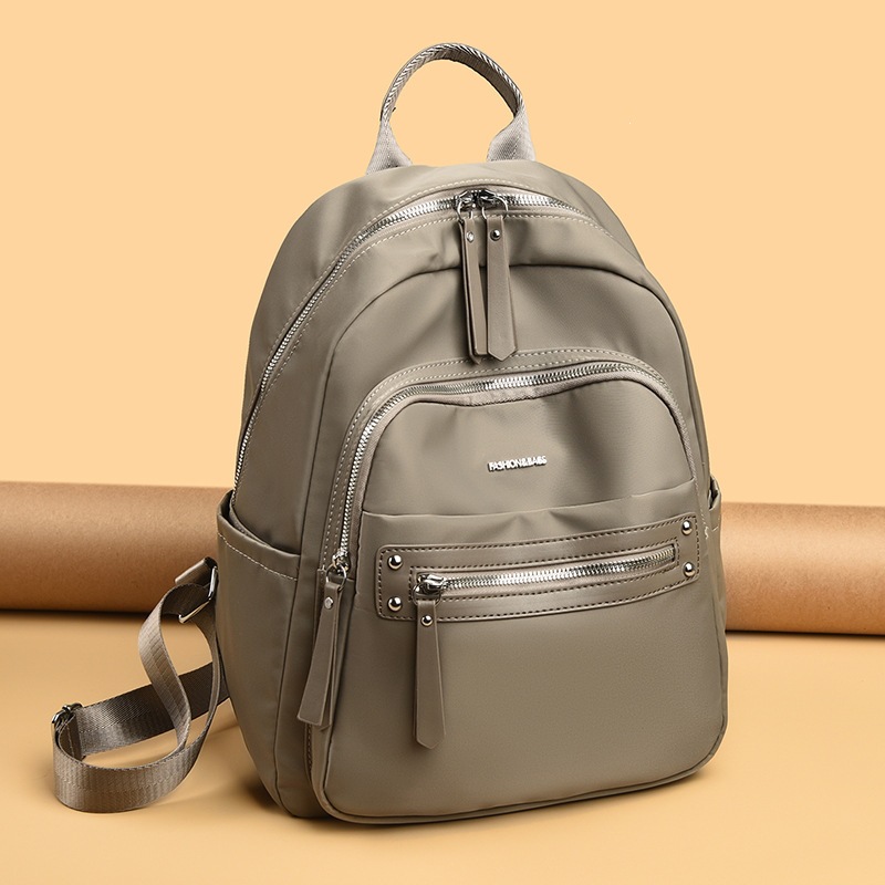 Mochila de comercio exterior mochila de hombro a prueba de agua ocio 2026 bolsas de mujer impermeables a prueba de agua tendencia de calle beige