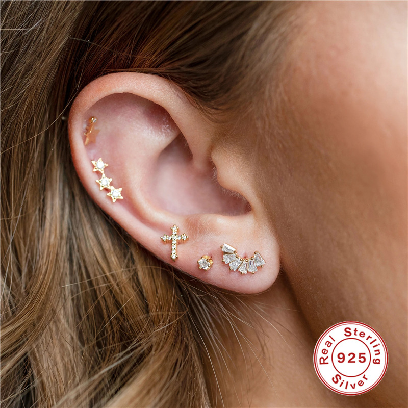 Nueva s925 plata esterlina moda europea y americana personalizada espiral de la manera perforada Cruz diamante giro tornillo pendientes