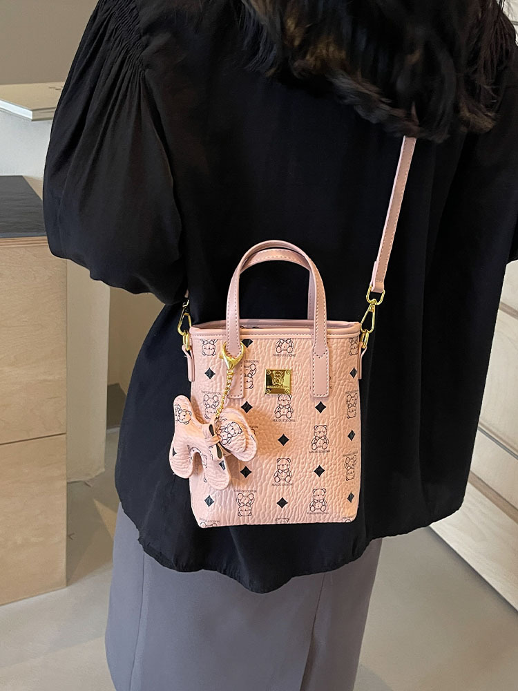 Bolsos de mujer transfronterizos nuevo bolso de diseño de nicho bolso de teléfono de oso de dibujos animados bolso de cubo de sentido avanzado bolso de mujer lindo