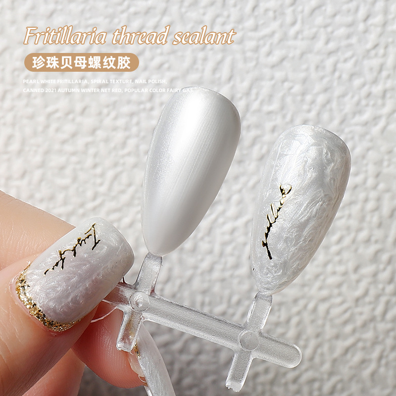 Internet celebridad universal perla fritillary textura esmalte de uñas pegamento 2021 nuevo otoño y el invierno popular francés borde dorado super brillante blanco