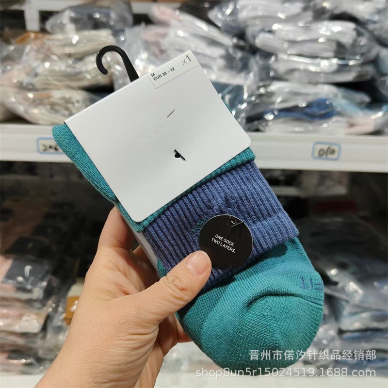 2023新品の偽の2つのつなぎ合わせのスポーツの靴下の中で筒の高い筒の男女の同項のマカロンカラーの厚いタオルの底