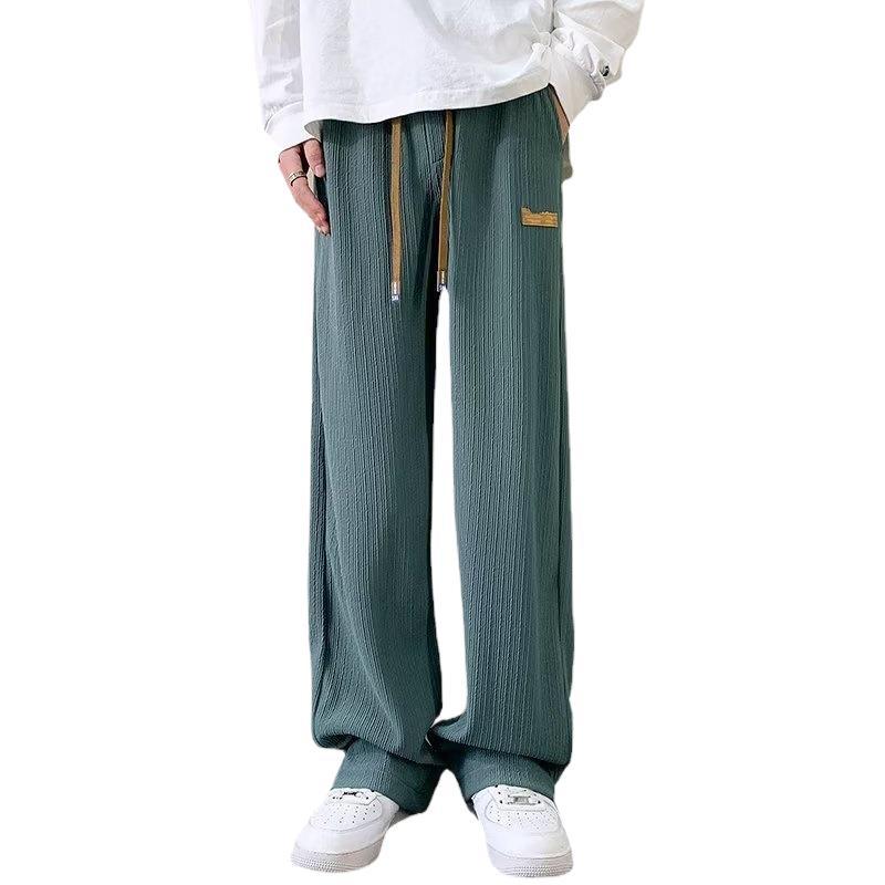 Pantalones de chándal hombres primavera y otoño verano 2023 delgada suelta recta estilo japonés moda drapeado hombres pantalones largos ocasionales