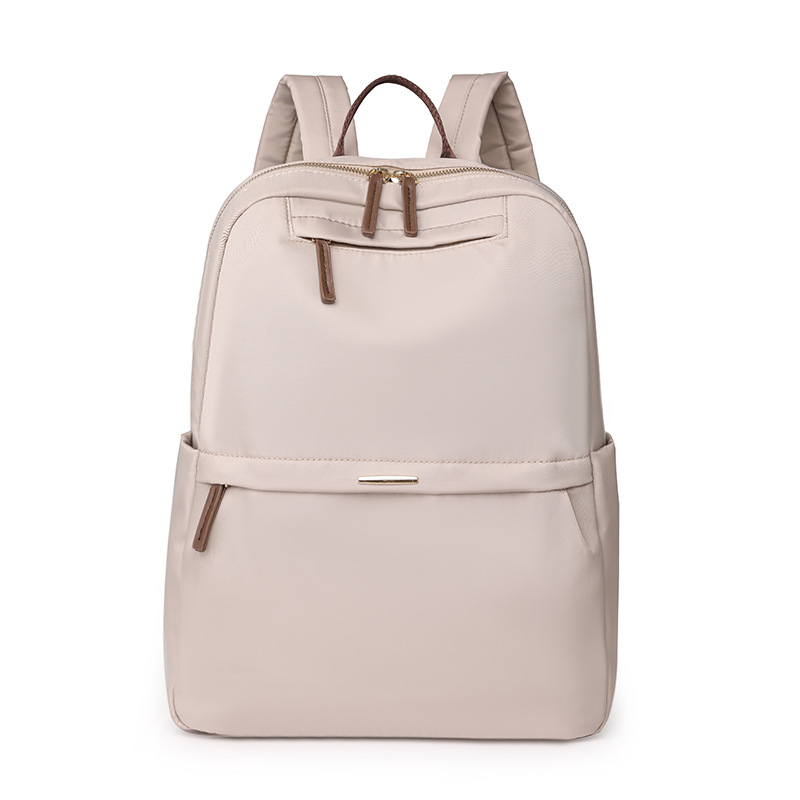 En stock al por mayor 2024 nuevas mujeres mochila de nylon simple color sólido gran capacidad ordenador mochila estudiante