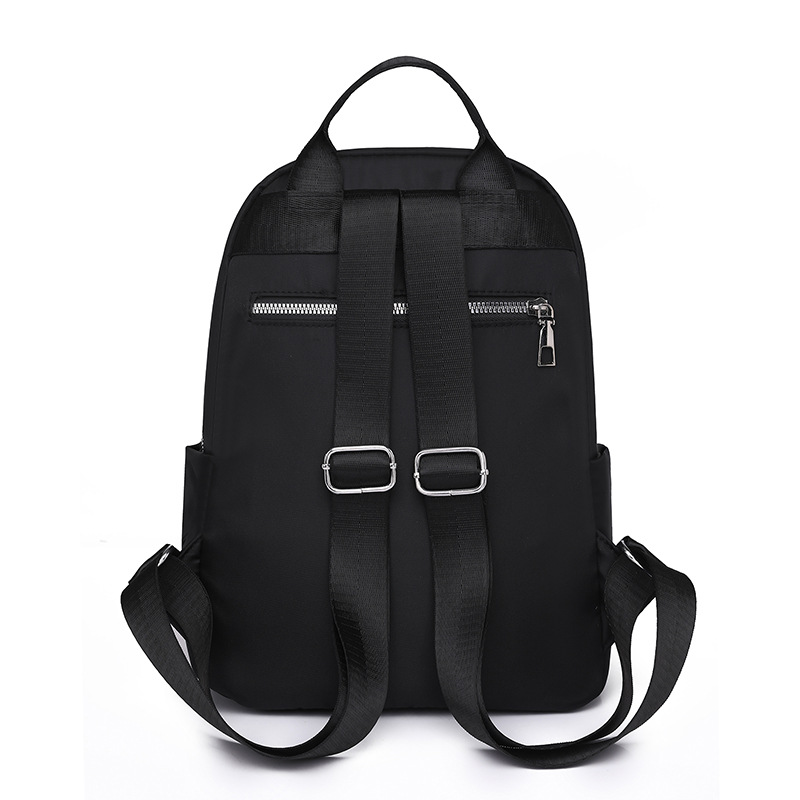 2024 nueva mochila de nylon bordada casual para mujer simple y ligera mochila de viaje de viaje urbano mochila escolar de moda