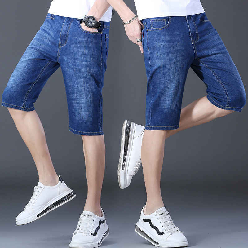夏の薄いタイプの7分のズボンの男性のまっすぐな筒の紳士服のデニムのショートパンツの弾力性は夏の青年の中でズボンを修理します。|undefined