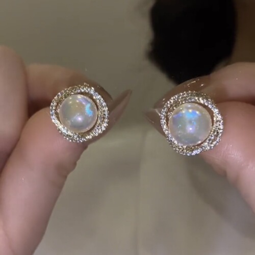 Micro-inlaid zircon Mermaid earrings S925 silver needle mermaid beads three-dimensional rotating temperament earrings lady's light luxury style