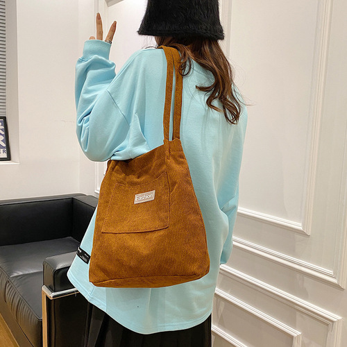 New corduroy women's portable tote bag, large capacity, stylish student tutoring shoulder bag, soft girl shopping bag