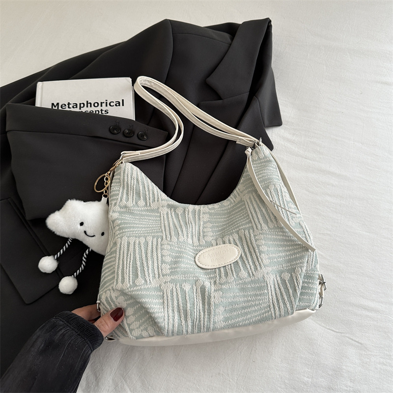 Bolso de lona para mujeres 2024 nuevo otoño bolso universitario de doble propósito mochila de hombro de viaje universal mochila de hombro