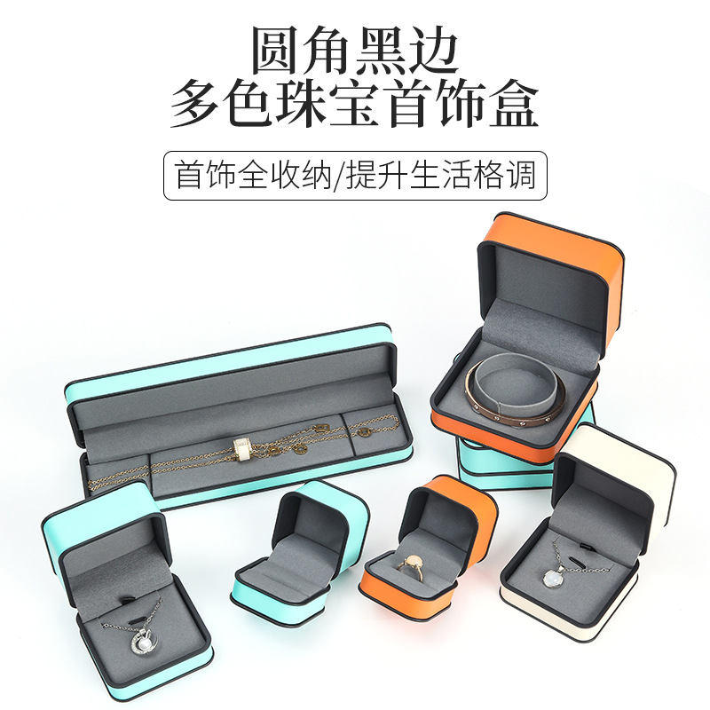 Nuevo creativo de ángulo negro borde redondo caja de joyería tricolor caja de joyería de calidad anillo pendientes caja de collar caja de embalaje de joyería de alta calidad