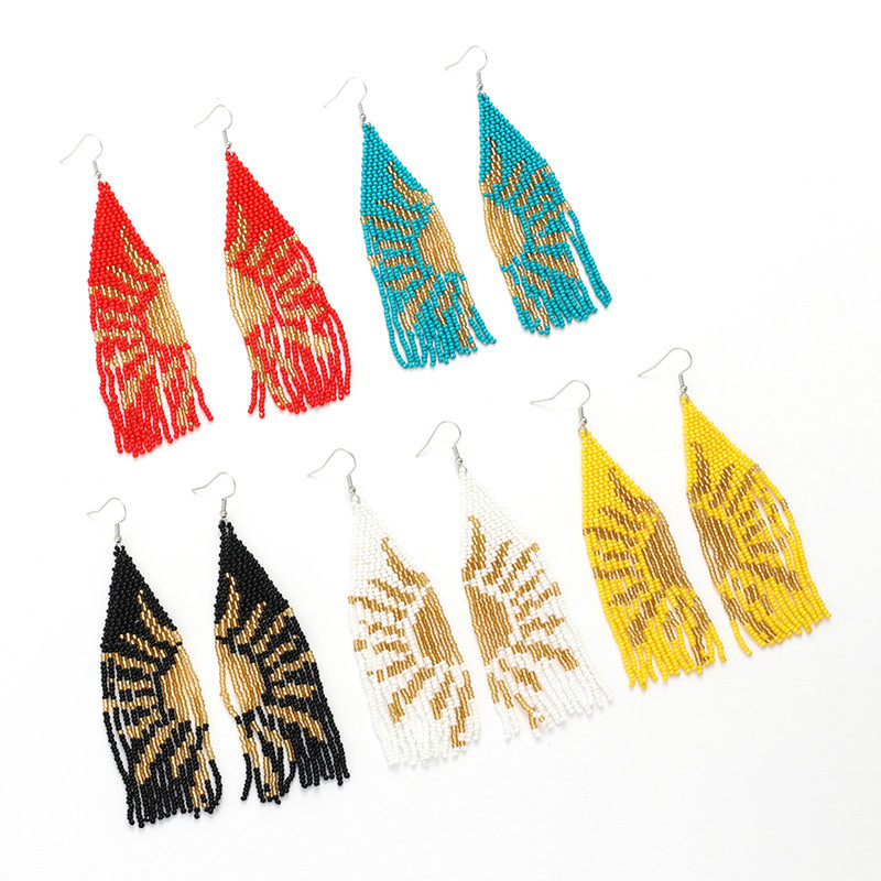 Woven ethnic earrings handmade with tassels solar-powered