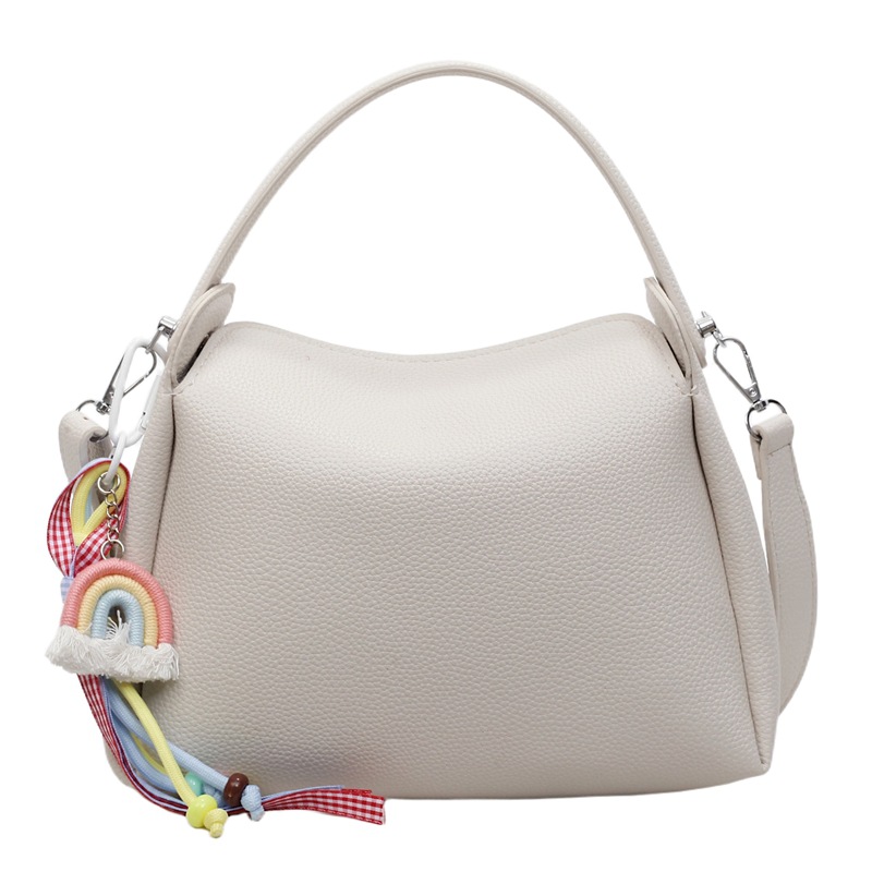 Bolso pequeño de mano para mujer 2025 nuevo bolso de mensajero de hombro de moda de lujo ligero bolso de caja de almuerzo de alta gama de nicho bolso de cubo