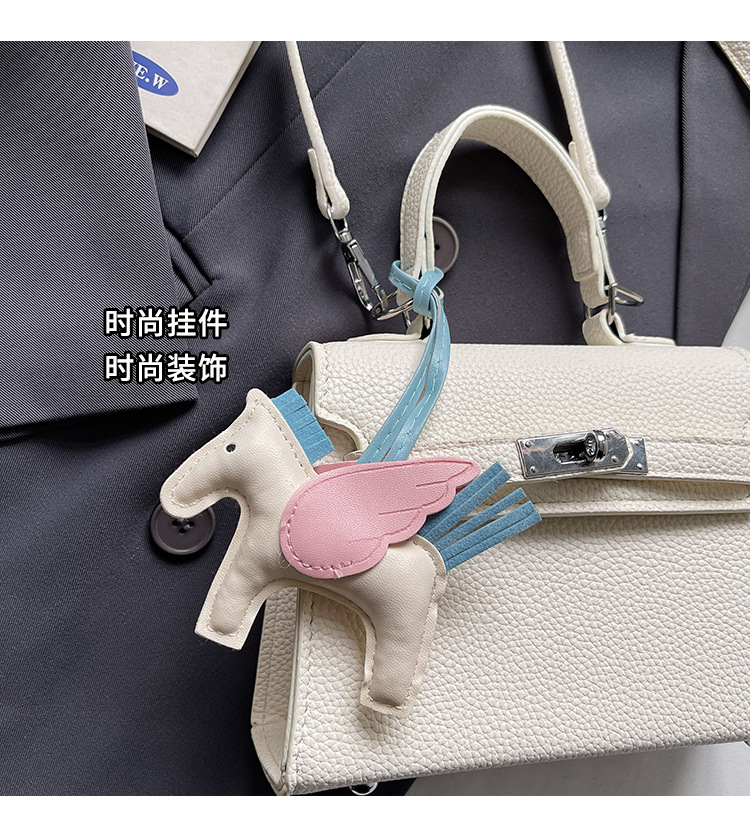 The Korean version of the hand-held small square bag for women in 2025, a new single-shoulder bag with a niche design, simple and versatile, trendy crossbody Kelly bag undefined